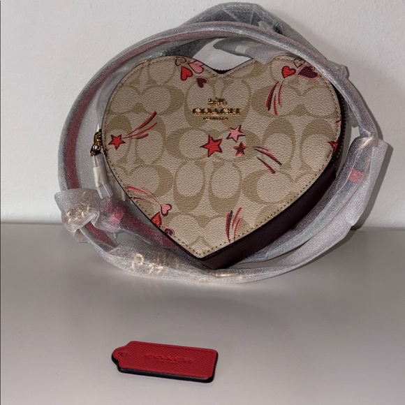 Coach Heart Crossbody In Signature
Canvas With Heart And Star Print nwt - Picture 9 of 10